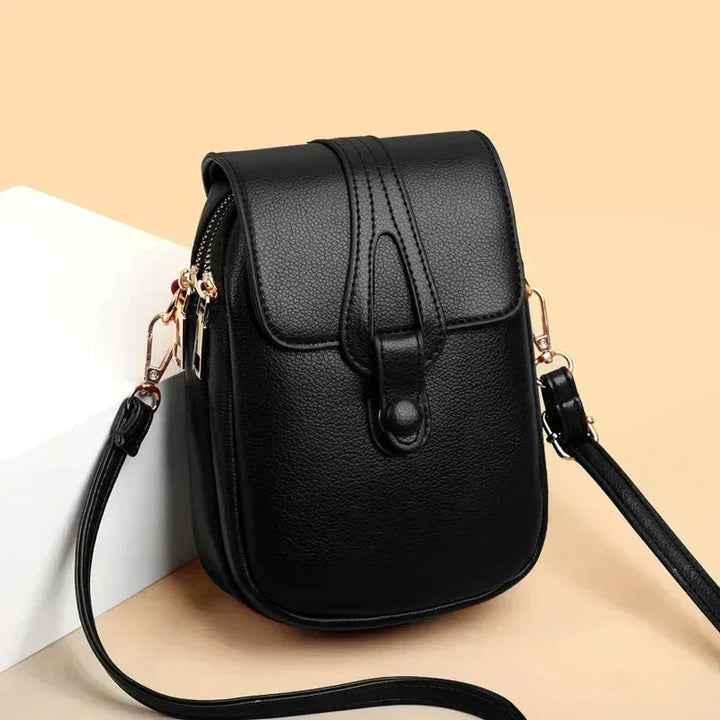 Genuine leather vintage shoulder bag for women, retro style, elegant accessory.