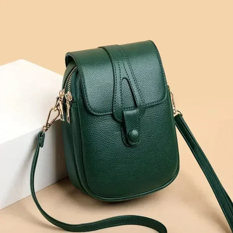Women's classic leather crossbody bag, timeless vintage design, perfect for daily fashion.