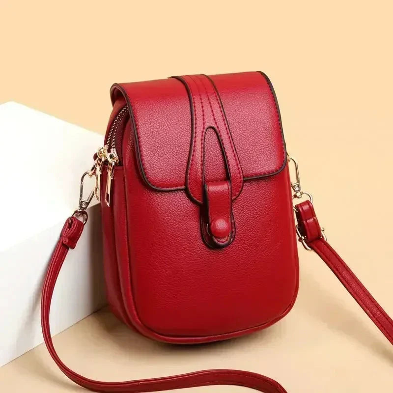Elegant women's genuine leather shoulder bag with adjustable strap, vintage style handbag.