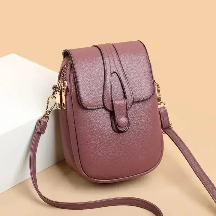 Timeless women's vintage leather shoulder bag, classic design, versatile fashion accessory.