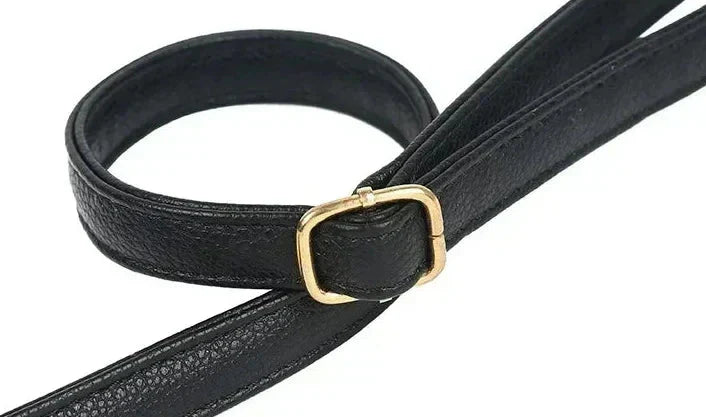 Women's vintage genuine leather shoulder bag with secure flap closure, retro design.