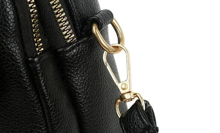 Fashionable women's vintage leather shoulder bag, a chic retro accessory for any outfit.