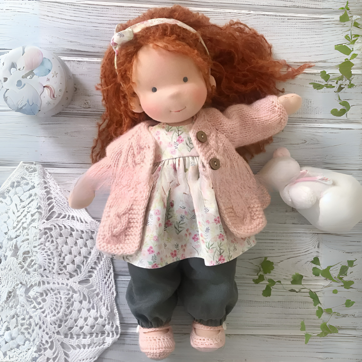 Girls' natural Waldorf doll, made for nurturing imaginative play and gentle comfort.
