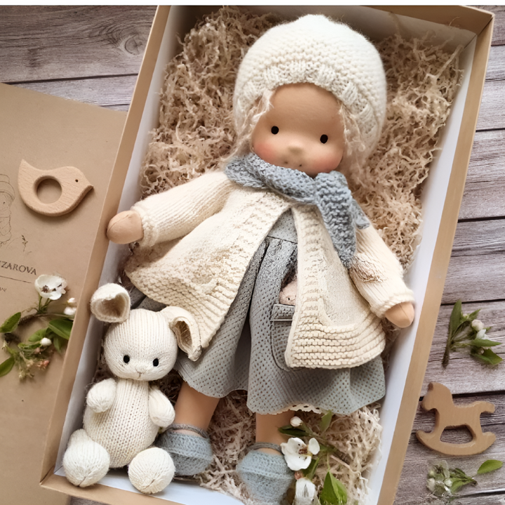 Beautiful handmade Waldorf doll, inspiring creative play and joyful childhood.