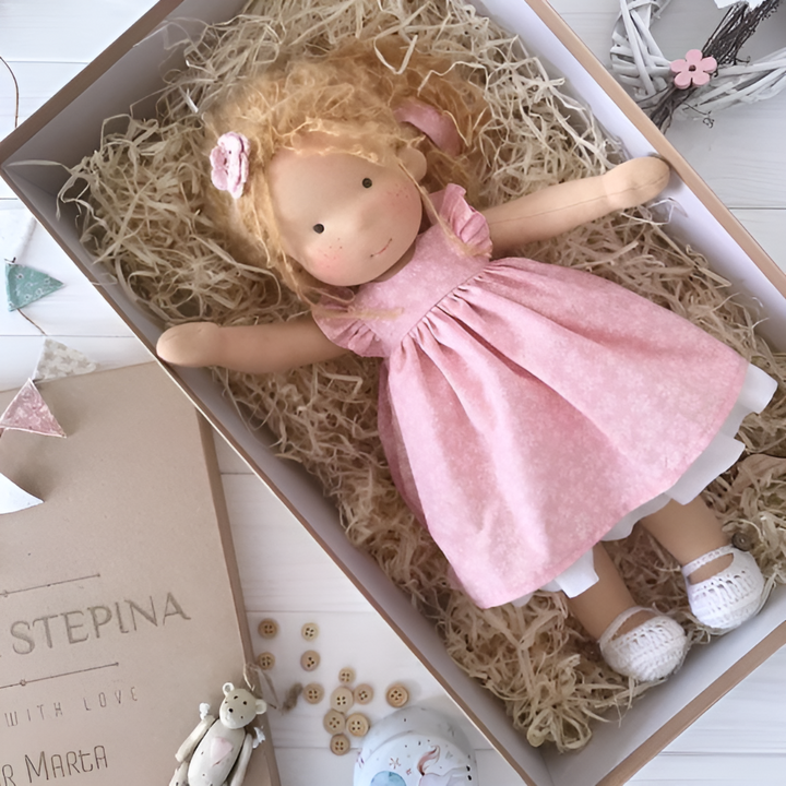 Soft cotton wool Waldorf doll, an ideal gift for toddlers and imaginative play.