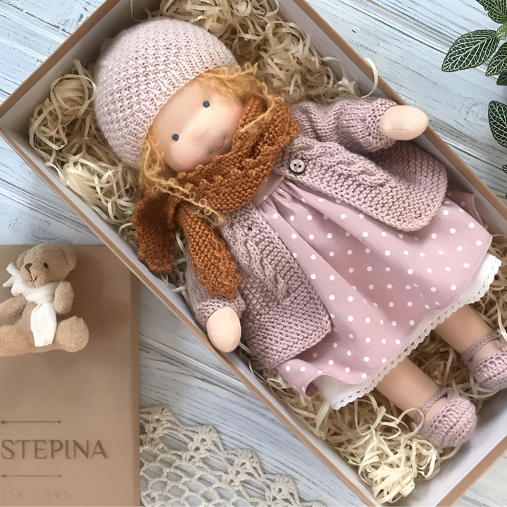 Handmade Waldorf plush doll, encouraging imaginative play and creative storytelling.