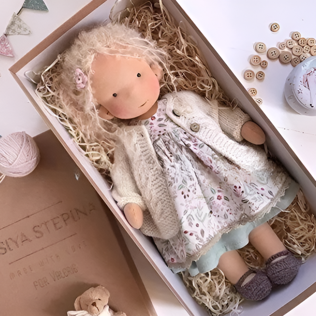 Waldorf-inspired cotton wool doll, designed for imaginative play and comforting cuddles.