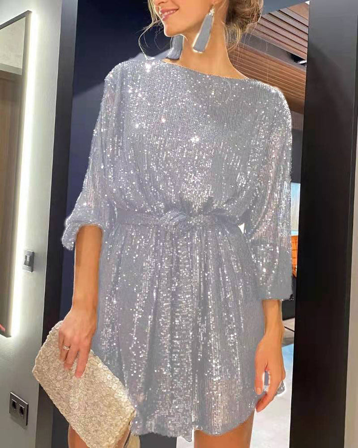 Sparkling women's sequin mini cocktail dress featuring a chic waist belt for evening wear.