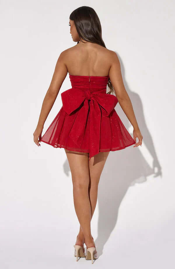 Stunning women's sparkling mini dress with ribbon back. A glamorous sleeveless choice for parties & summer evenings.