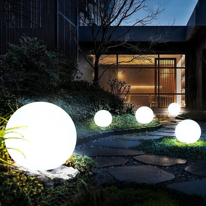 Beautiful spherical outdoor decor light, GlowSphere LED, adds enchanting ambiance to any garden.