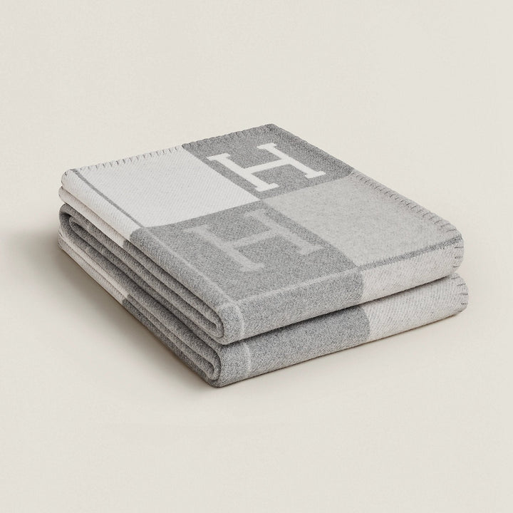 Golden cashmere and wool decorative throw, a soft, luxurious home accent.