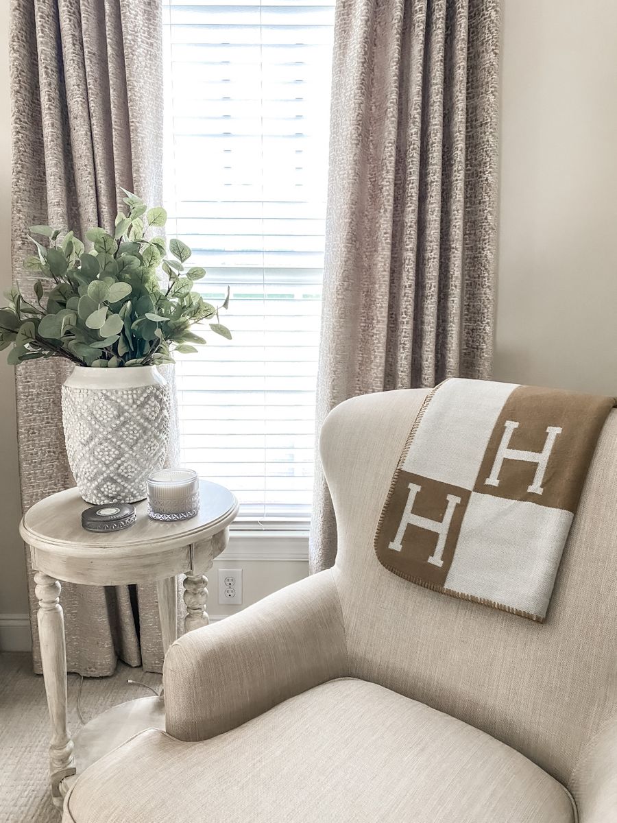 Elegant gold cashmere wool throw, enhances living room or bedroom decor with style.