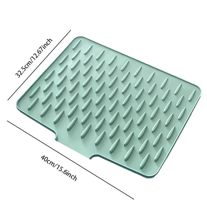 Efficient silicone dish drying mat for kitchen counters. Non-slip & heat-resistant, keeps your countertop dry & organized.