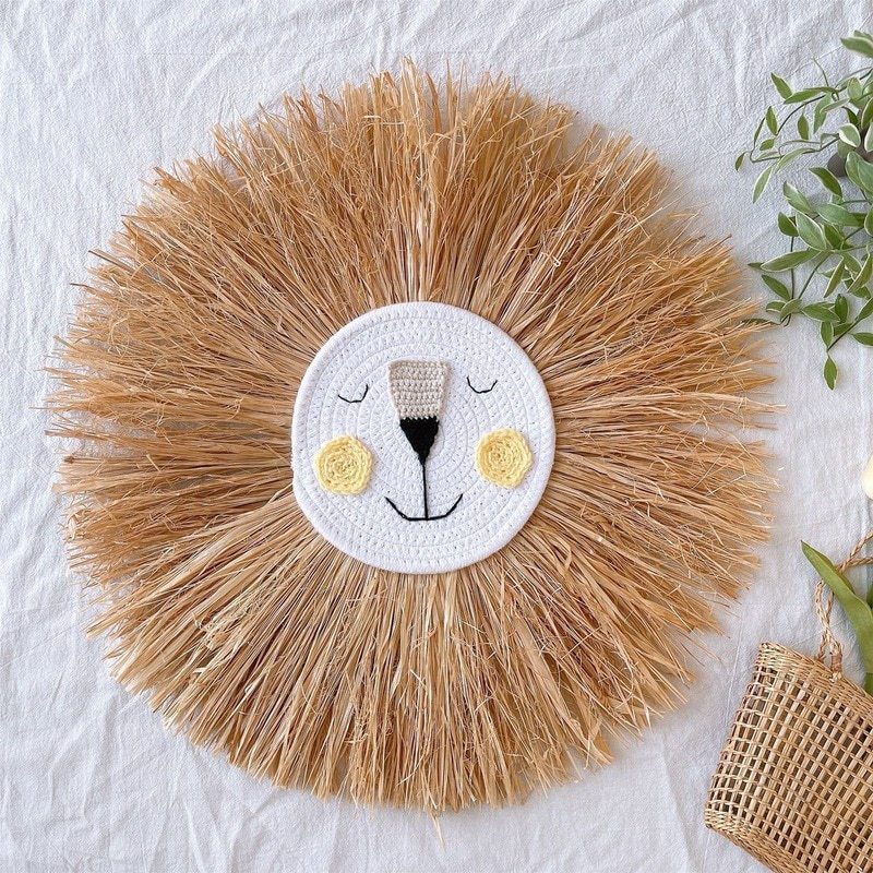 Handmade rattan lion wall decor. Perfect animal wall art for a unisex nursery or kids' room.