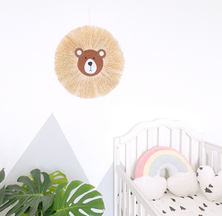 Natural rattan lion wall art. Handmade animal decor, perfect for unisex baby rooms & play areas.