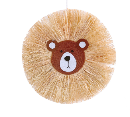 Sustainable rattan lion decor, handmade animal wall art for a modern baby room & children's space.