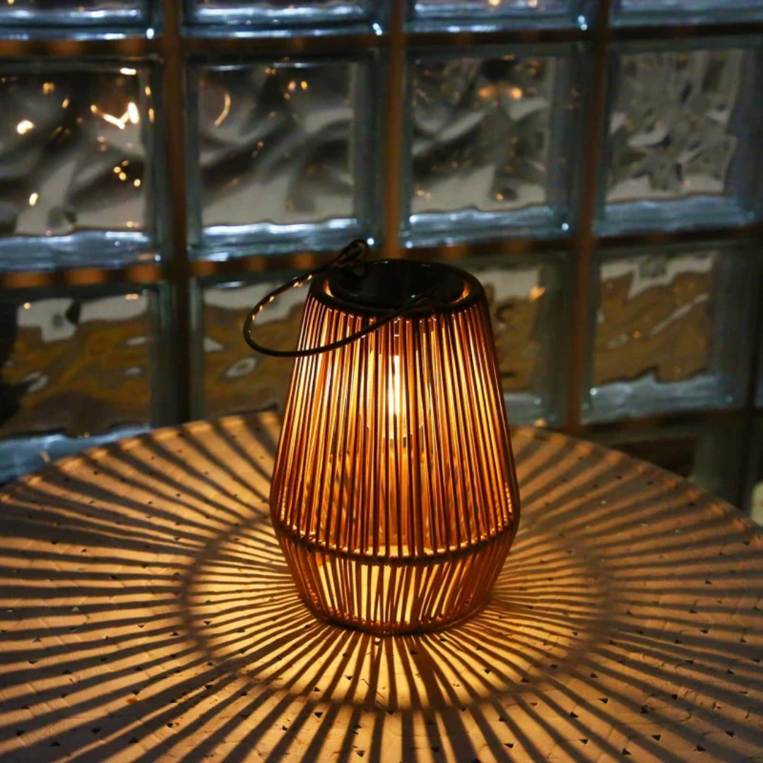Stylish handwoven rattan solar lantern, waterproof garden lamp for enchanting patio & landscape decor.
