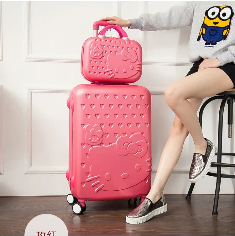 Durable hard shell travel suitcase set, featuring a unique playful cat design. Perfect for student travel.
