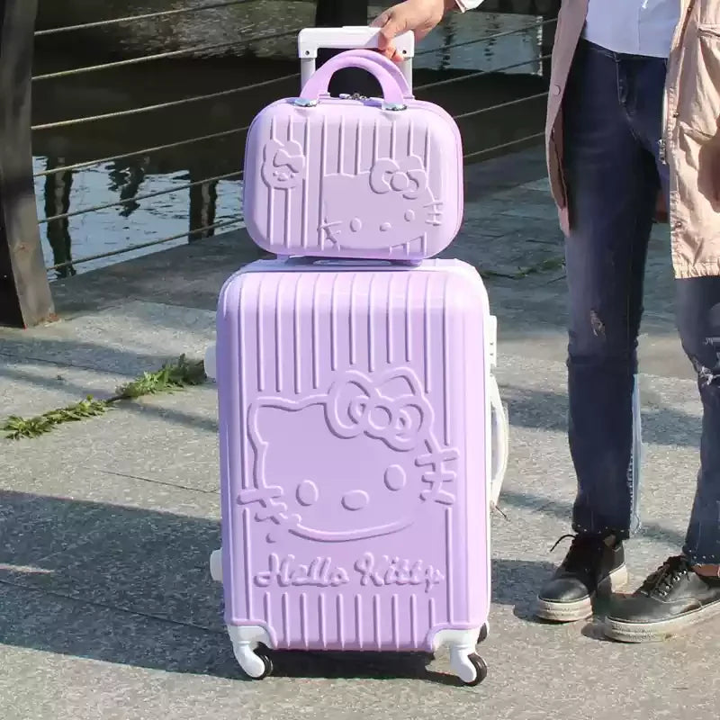 Stylish hard shell travel suitcase set. Durable, playful cat design, ideal for student or adventure travel.