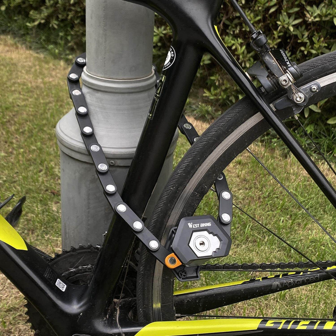 Folding bicycle lock with hardened steel links. Essential anti-theft bike security for outdoor gear.