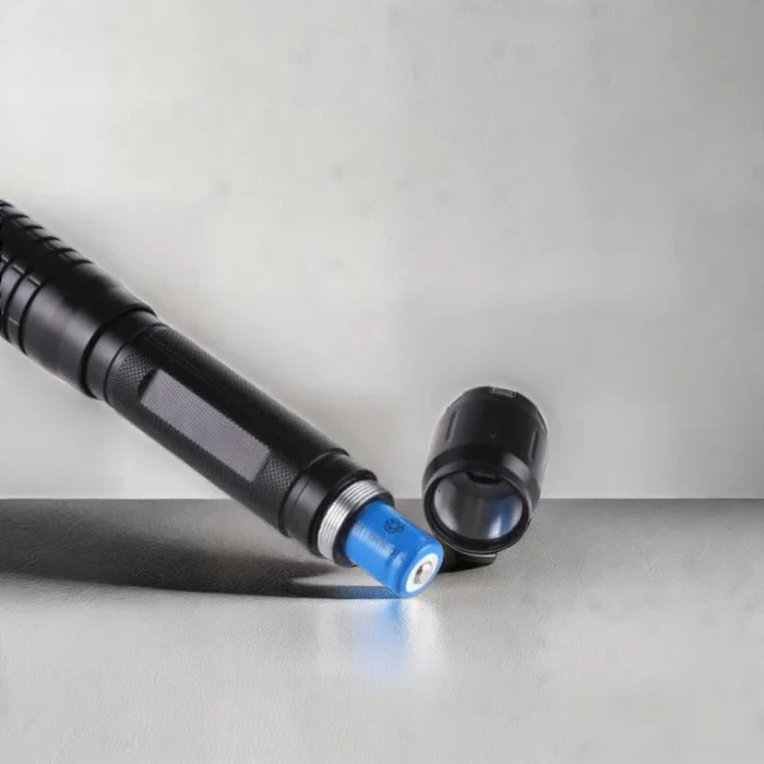 Rechargeable outdoor laser lamp flashlight, powerful focused beam for emergencies, camping & hiking. Unisex design.