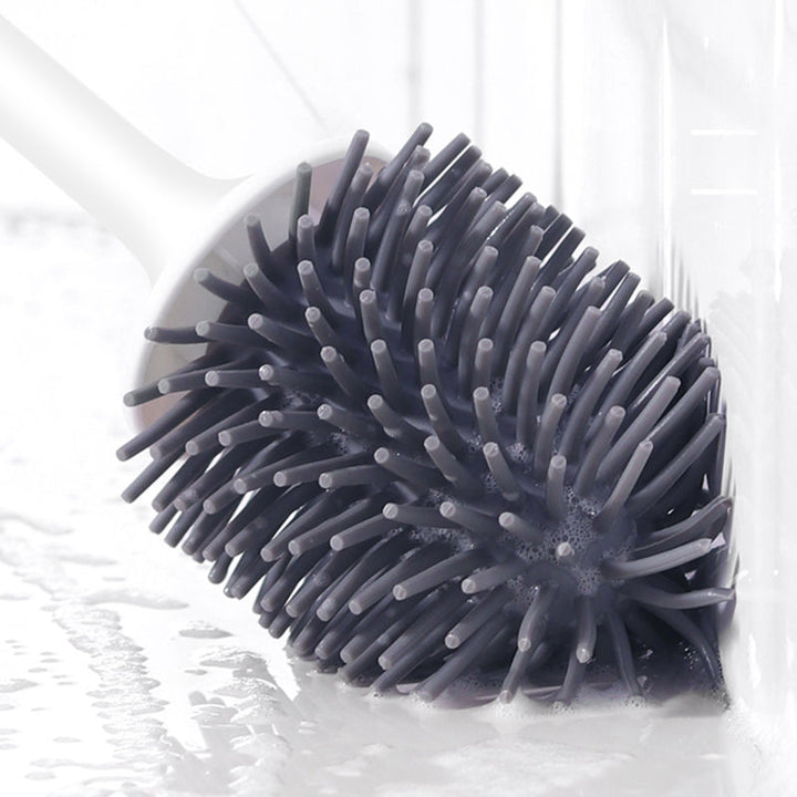"Hygienic silicone toilet brush with holder, non-scratch bristles, white handle, wall-mounted and floor-standing options."