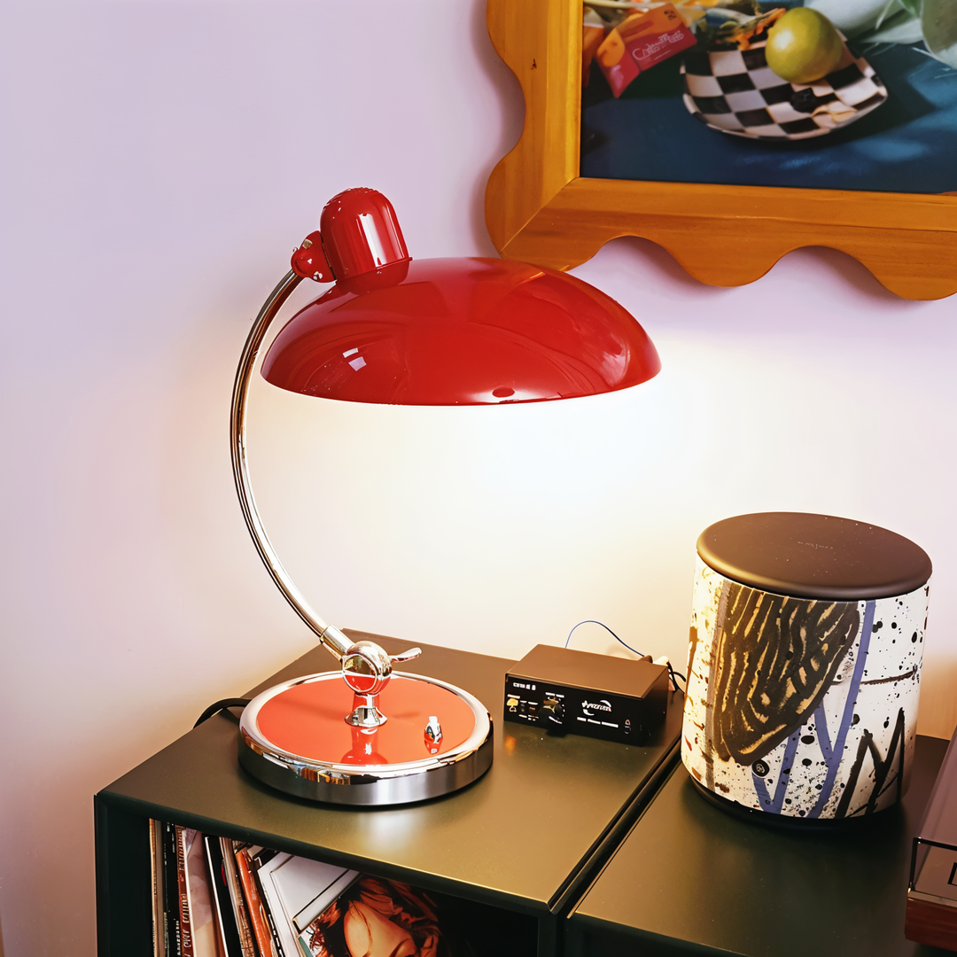 Articulated arm industrial desk lamp, vintage black metal finish, ideal table light.