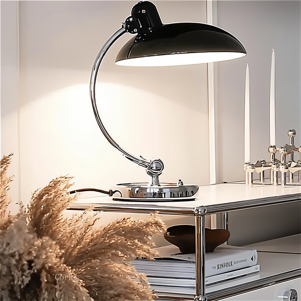 Sturdy metal industrial desk lamp, vintage black, adjustable for optimal office use.