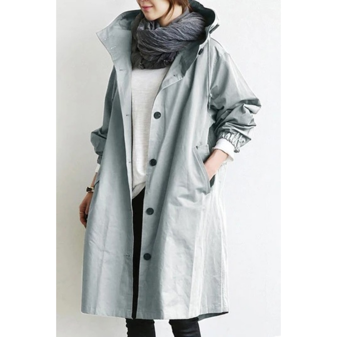 Warm & stylish women's long hooded trench coat, perfect as a waterproof and windproof autumn/winter jacket.