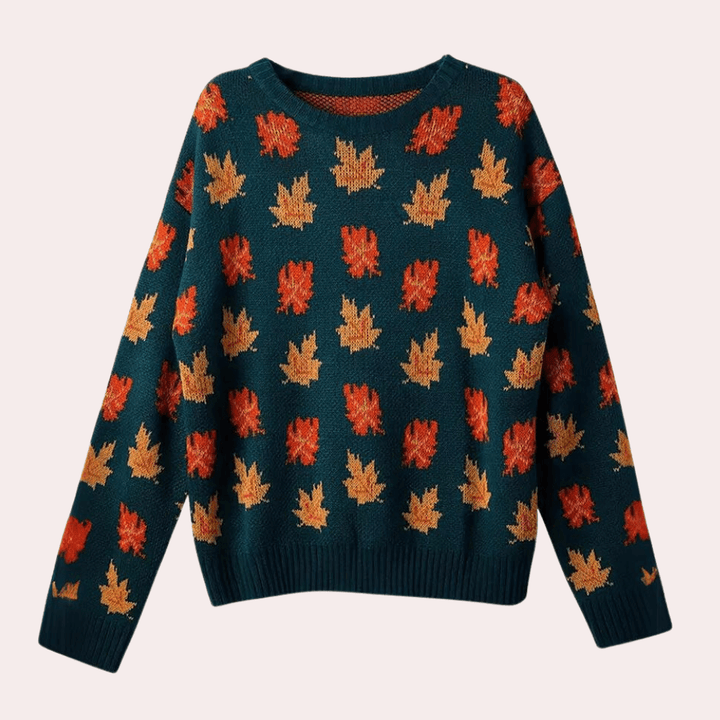 Green knitted women's sweater with elegant leaf pattern. Perfect long sleeve pullover for cozy fall fashion.