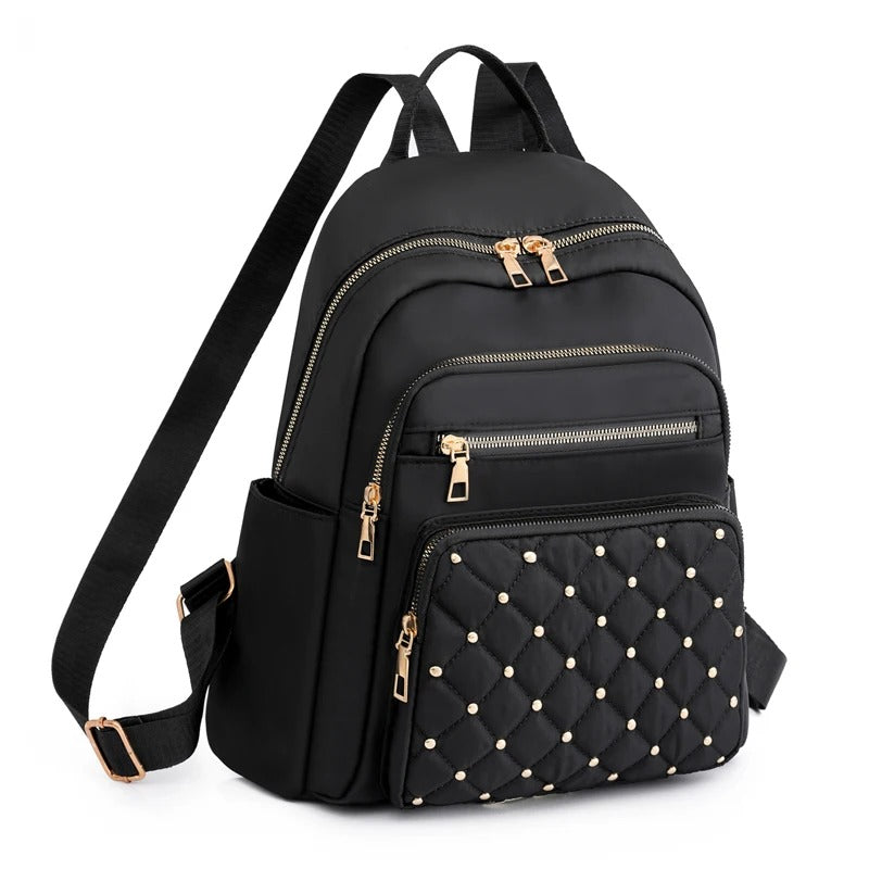 Khaki women's lightweight water-resistant nylon backpack for travel, school & daily use.