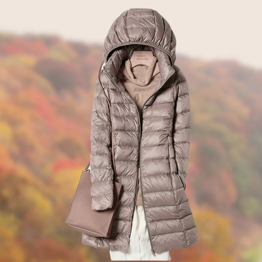 Khaki women's long hooded puffer jacket, warm winter coat for stylish cold weather protection.