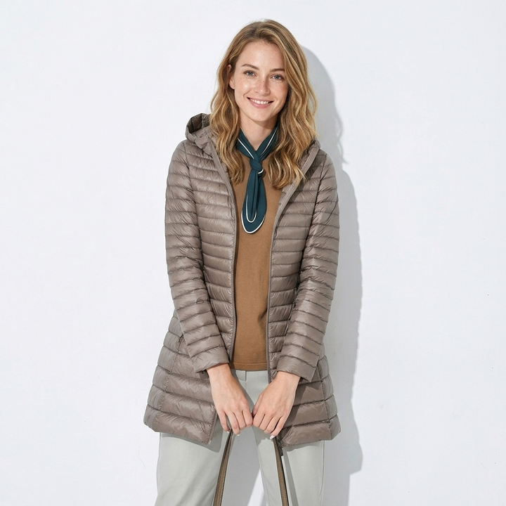 Khaki women's zip-up long hooded puffer jacket, a warm and practical winter coat for women.