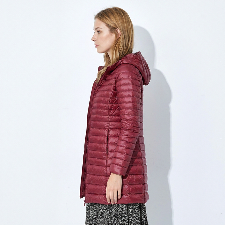 Warm women's long hooded puffer jacket, essential winter coat available in khaki and burgundy.