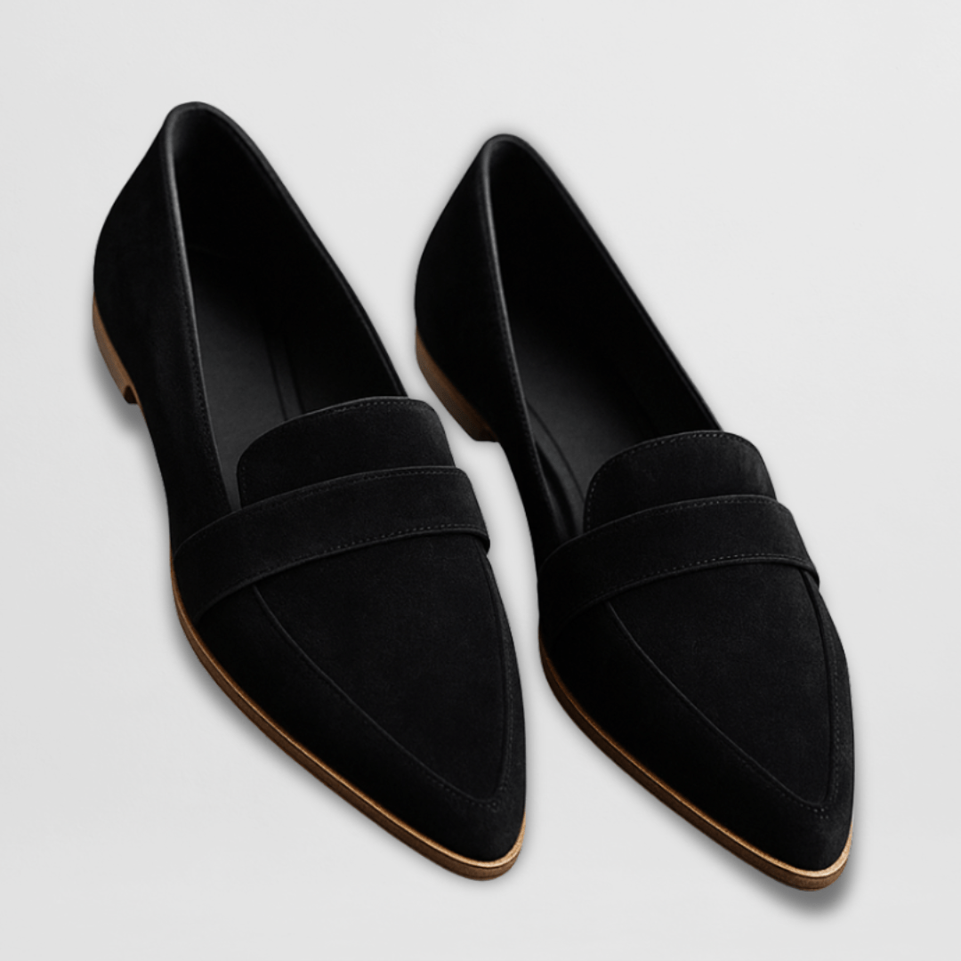 Black women's pointed toe loafers, elegant penny strap slip-on flats. Perfect fashion footwear for office and chic casual wear.