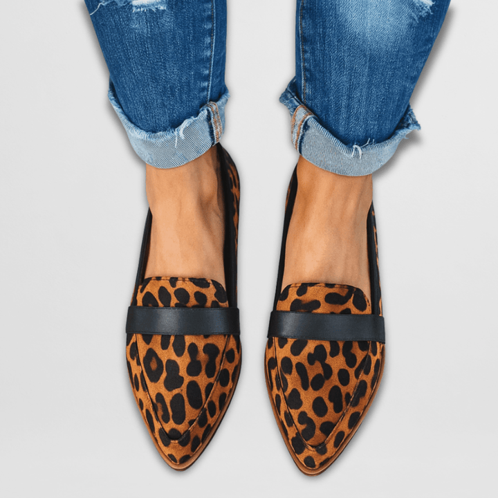 Leopard print women's pointed toe loafers, trendy penny strap slip-on flats. Fashion-forward casual chic footwear.