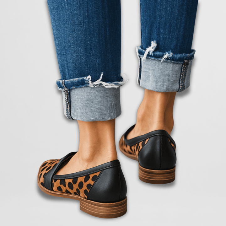 Stylish women's pointed toe loafers with penny strap. Slip-on flats in black, grey, khaki, leopard print for versatile wear.