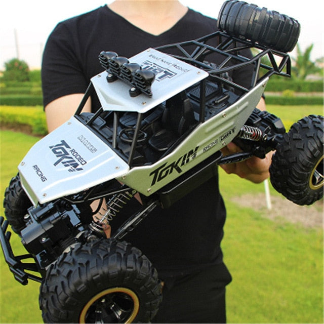 Large remote control monster truck, an all-terrain 4WD RC vehicle for kids' outdoor adventure.