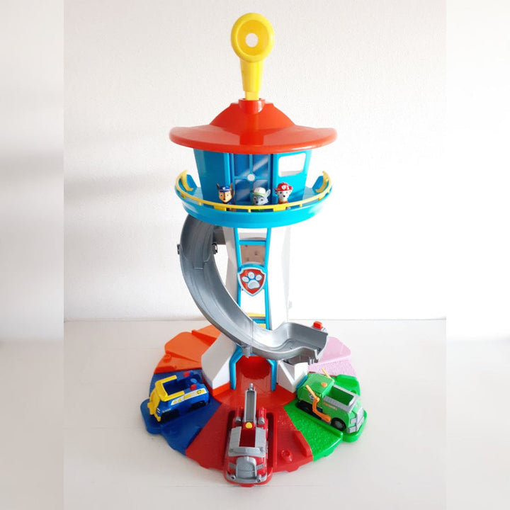 Children's activity slide tower playset for toy cars, featuring multi-level ramps and exciting vehicle action.