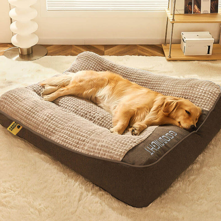 Large orthopedic dog bed with thick memory foam and neck support for comfortable sleep.