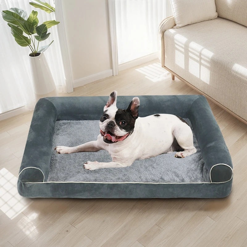 Large orthopedic memory foam dog bed for ultimate joint support. Features washable cover & anti-slip base for pet comfort.
