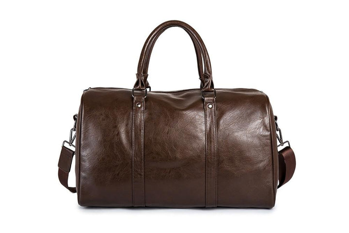 Versatile unisex leather travel duffel. Spacious, lightweight, & durable for any journey.