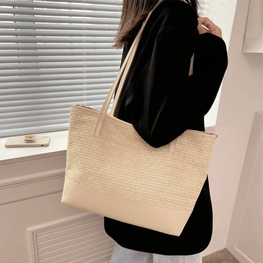 Textured beige woven large tote bag, a stylish women's shoulder bag perfect for everyday casual outfits.