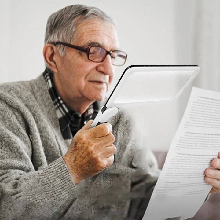 Portable LED magnifier, 5x power, dimmable light. Ideal reading aid for seniors & low vision.