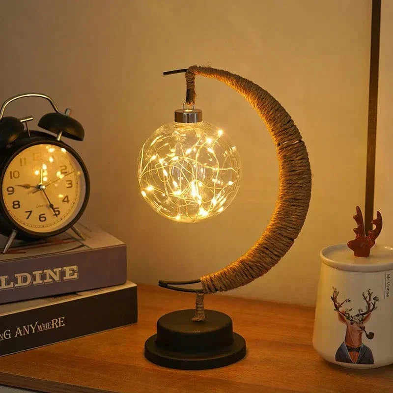 The LED Moon Star Night Light illuminating a corner of a room, creating a captivating and serene atmosphere.