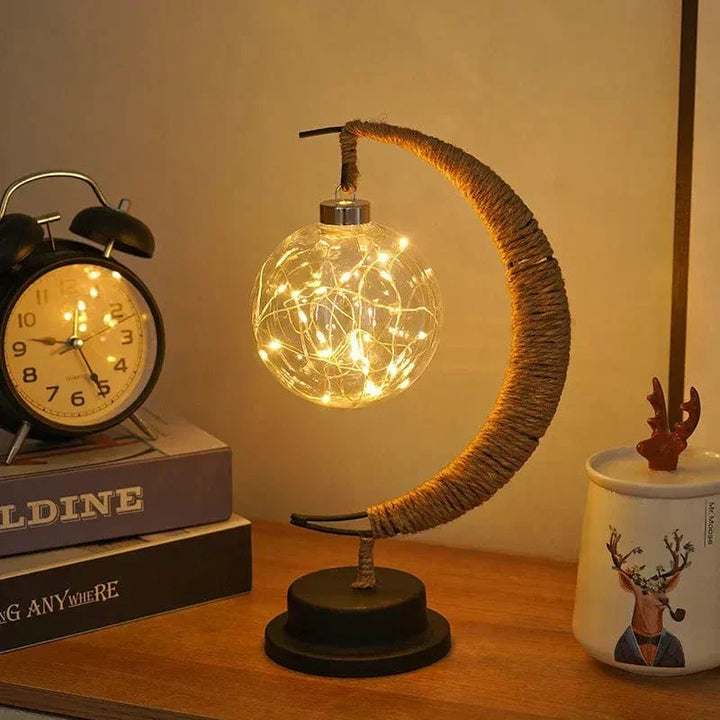 The LED Moon Star Night Light illuminating a corner of a room, creating a captivating and serene atmosphere.
