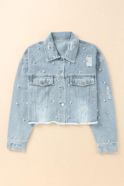 Casual & stylish women's light blue denim jacket with elegant pearl trim details.