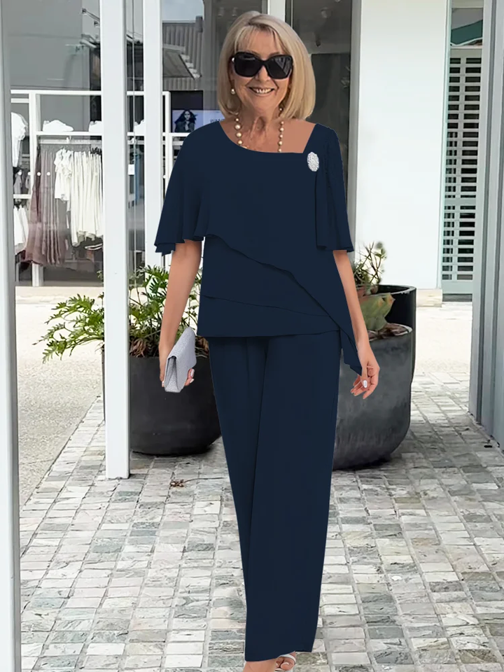 Comfortable navy blue flowy two-piece set for women. Versatile casual chic outfit, ideal for summer elegance.