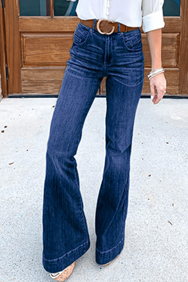 Deep blue women's bell bottom denim jeans with a high waist, perfect for a vintage-inspired casual look.