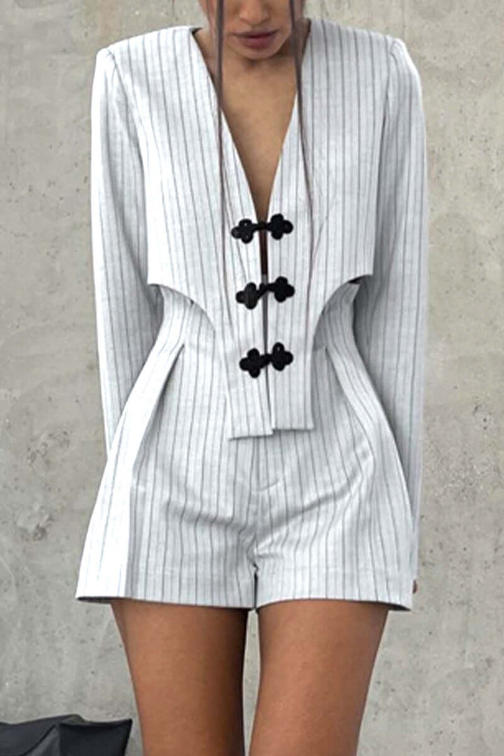 Comfortable women's two-piece set: a stylish V-neck long sleeve top with matching striped high-waist shorts.
